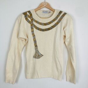 Vintage cream colored angora and lambs wool sweater with beaded detail. Medium